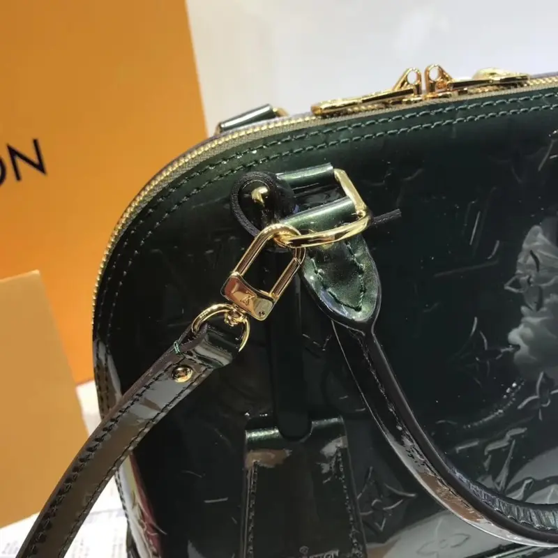 Alma-BB-Top-Handle-Satchel-in-Monogram-Vernis-Leather-M50415-Dark-Green-Alma-BB-Top-Handle-Satchel-in-Monogram-Vernis-Leather-M50415-Dark-Green-3.webp