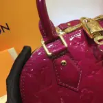 Alma-BB-Top-Handle-Satchel-in-Monogram-Vernis-Leather-M50415-Rosy-Alma-BB-Top-Handle-Satchel-in-Monogram-Vernis-Leather-M50415-Rosy-3.webp