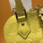 Alma-BB-Top-Handle-Satchel-in-Monogram-Vernis-Leather-M50415-Yellow-Alma-BB-Top-Handle-Satchel-in-Monogram-Vernis-Leather-M50415-Yellow-2.webp