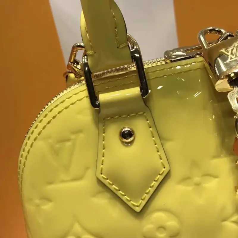 Alma-BB-Top-Handle-Satchel-in-Monogram-Vernis-Leather-M50415-Yellow-Alma-BB-Top-Handle-Satchel-in-Monogram-Vernis-Leather-M50415-Yellow-2.webp