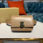 Belted-Leather-Crossbody-Bag-with-Monogram-Clasp-80122041-Apricot-Belted-Leather-Crossbody-Bag-with-Monogram-Clasp-80122041-Apricot-1.webp