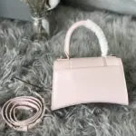 Curvy-Silhouette-Hourglass-XS-Top-Handle-Shiny-Calfskin-Tote-Light-Pink-Curvy-Silhouette-Hourglass-XS-Top-Handle-Shiny-Calfskin-Tote-Light-Pink-2.webp