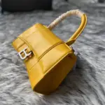 Curvy-Silhouette-Hourglass-XS-Top-Handle-Shiny-Calfskin-Tote-Yellow-Curvy-Silhouette-Hourglass-XS-Top-Handle-Shiny-Calfskin-Tote-Yellow-2.webp