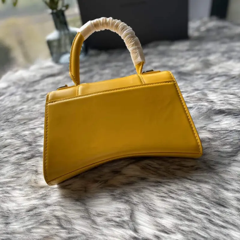 Curvy-Silhouette-Hourglass-XS-Top-Handle-Shiny-Calfskin-Tote-Yellow-Curvy-Silhouette-Hourglass-XS-Top-Handle-Shiny-Calfskin-Tote-Yellow-3.webp