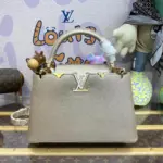 Elegant-Top-Handle-Mini-Bag-in-Golden-Champagne-M22436-PM-Elegant-Top-Handle-Mini-Bag-in-Golden-Champagne-M22436-PM-1.webp