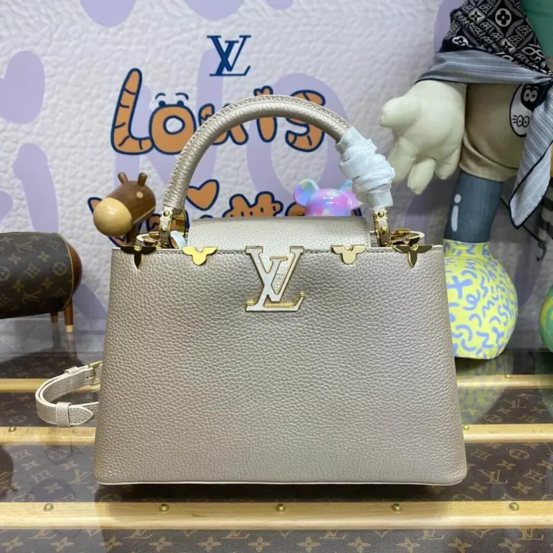 Elegant-Top-Handle-Mini-Bag-in-Golden-Champagne-M22436-PM-Elegant-Top-Handle-Mini-Bag-in-Golden-Champagne-M22436-PM-1.webp