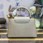Elegant-Top-Handle-Mini-Bag-in-Golden-Champagne-M22436-PM-Elegant-Top-Handle-Mini-Bag-in-Golden-Champagne-M22436-PM-2.webp