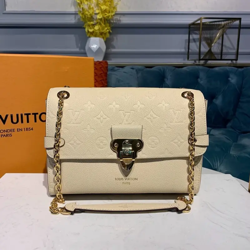 Embossed-Monogram-Vavin-PM-Chain-Shoulder-Bag-M52271-M44523-Creme-Embossed-Monogram-Vavin-PM-Chain-Shoulder-Bag-M52271-M44523-Creme-2.webp