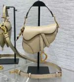 Grained-Leather-Mini-Saddle-Crossbody-with-Adjustable-Strap-M0456-Beige-Grained-Leather-Mini-Saddle-Crossbody-with-Adjustable-Strap-M0456-Beige-1.webp