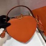 Heart-Shaped-Saffiano-Leather-Odette-Crossbody-Shoulder-Bag-1BH144-Orange-Heart-Shaped-Saffiano-Leather-Odette-Crossbody-Shoulder-Bag-1BH144-Orange-3.webp