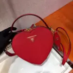 Heart-Shaped-Saffiano-Leather-Odette-Crossbody-Shoulder-Bag-1BH144-Red-Heart-Shaped-Saffiano-Leather-Odette-Crossbody-Shoulder-Bag-1BH144-Red-2.webp