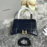 Hourglass-S-Top-Handle-Tote-in-Croc-Effect-Leather-Purple-Hourglass-S-Top-Handle-Tote-in-Croc-Effect-Leather-Purple-1.webp