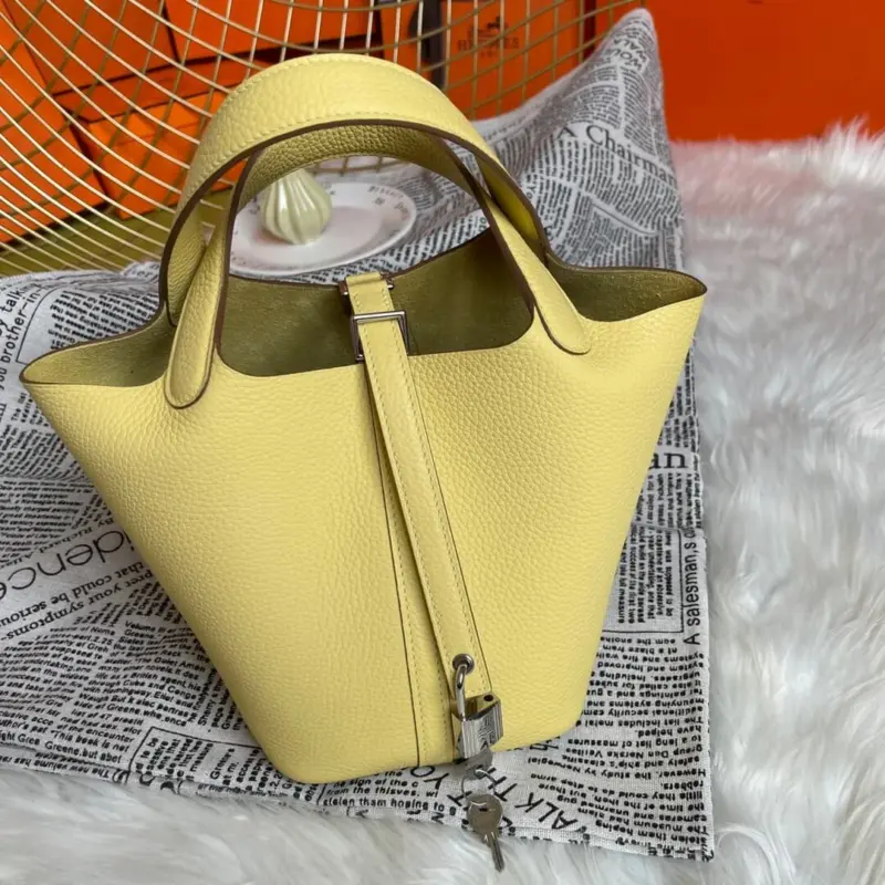 Limoncello-Yellow-Lock-Bucket-Bag-in-Clemence-Leather-18-Limoncello-Yellow-Lock-Bucket-Bag-in-Clemence-Leather-18-1.webp