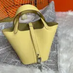 Limoncello-Yellow-Lock-Bucket-Bag-in-Clemence-Leather-22-Limoncello-Yellow-Lock-Bucket-Bag-in-Clemence-Leather-22-1.webp