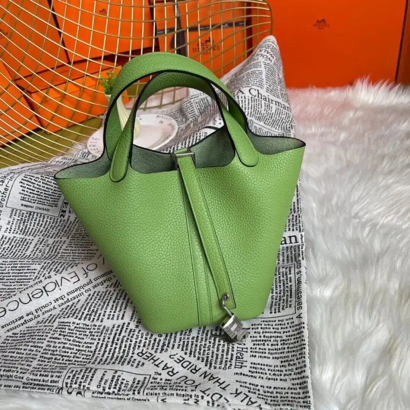 Locking-Top-Handle-Bucket-Bag-in-Green-Clemence-Leather-18-Locking-Top-Handle-Bucket-Bag-in-Green-Clemence-Leather-18-1.webp