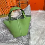 Locking-Top-Handle-Bucket-Bag-in-Green-Clemence-Leather-22-Locking-Top-Handle-Bucket-Bag-in-Green-Clemence-Leather-22-2.webp