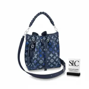 Mahina Perforated Calfskin Muria Drawstring Bucket Bag M59554