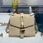 Medium-Aby-Day-Padlock-Top-Handle-Shoulder-Bag-1188-Beige-Medium-Aby-Day-Padlock-Top-Handle-Shoulder-Bag-1188-Beige-1.webp