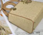 Medium-Structured-Top-Handle-Bag-in-Natural-Cannage-Raffia-M0565-10.webp