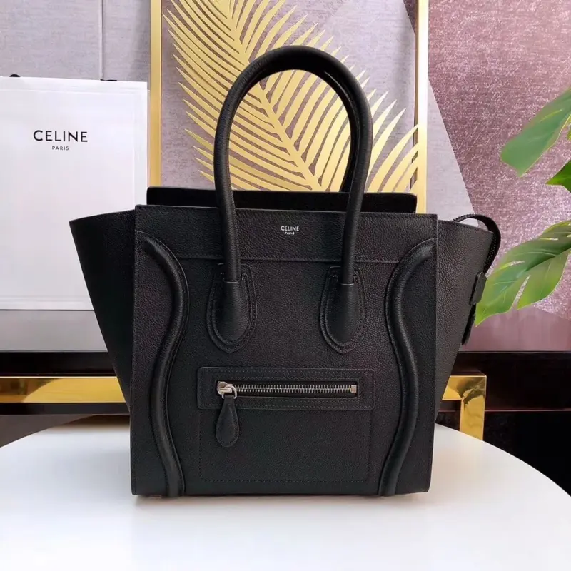 Micro-Luggage-Top-Handle-Tote-in-Drummed-Calfskin-189793-Black-Micro-Luggage-Top-Handle-Tote-in-Drummed-Calfskin-189793-Black-1.webp
