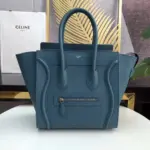 Micro-Luggage-Top-Handle-Tote-in-Drummed-Calfskin-189793-Blue-Micro-Luggage-Top-Handle-Tote-in-Drummed-Calfskin-189793-Blue-1.webp