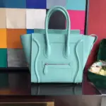 Micro-Luggage-Top-Handle-Tote-in-Drummed-Calfskin-189793-Light-Blue-Micro-Luggage-Top-Handle-Tote-in-Drummed-Calfskin-189793-Light-Blue-1.webp