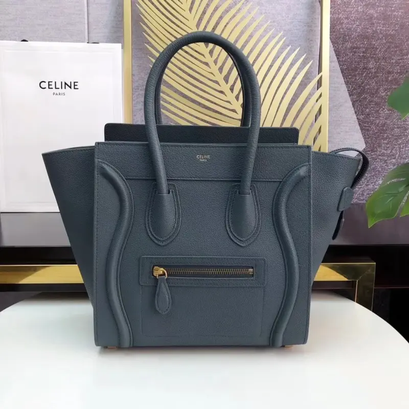 Micro-Luggage-Top-Handle-Tote-in-Drummed-Calfskin-189793-Navy-Blue-Micro-Luggage-Top-Handle-Tote-in-Drummed-Calfskin-189793-Navy-Blue-1.webp
