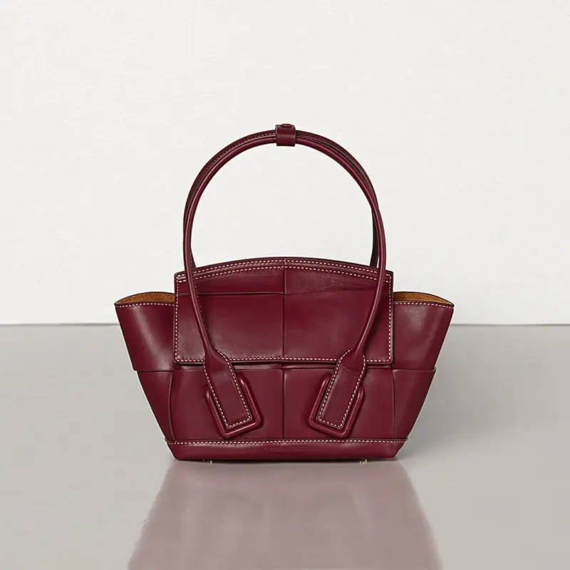 Mini-Arco-Top-Handle-Tote-in-Smooth-Calfskin-Leather-600606-Bordeaux-Mini-Arco-Top-Handle-Tote-in-Smooth-Calfskin-Leather-600606-Bordeaux-1.webp