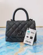 Mini-Top-Handle-Flap-Bag-in-Ultra-Matte-Calfskin-AS2215-Black-Mini-Top-Handle-Flap-Bag-in-Ultra-Matte-Calfskin-AS2215-Black-1.webp