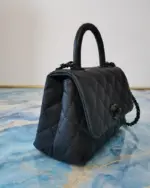 Mini-Top-Handle-Flap-Bag-in-Ultra-Matte-Calfskin-AS2215-Black-Mini-Top-Handle-Flap-Bag-in-Ultra-Matte-Calfskin-AS2215-Black-2.webp