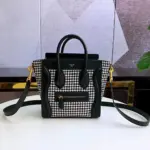 Miniature-Luggage-Handbag-in-Tweed-and-Smooth-Calfskin-Detail-189242-Black-Miniature-Luggage-Handbag-in-Tweed-and-Smooth-Calfskin-Detail-189242-Black-1.webp