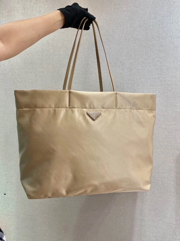 Mixed-Material-Tote-in-Re-Nylon-and-Saffiano-Leather-1BG107-Apricot-Mixed-Material-Tote-in-Re-Nylon-and-Saffiano-Leather-1BG107-Apricot-1.webp