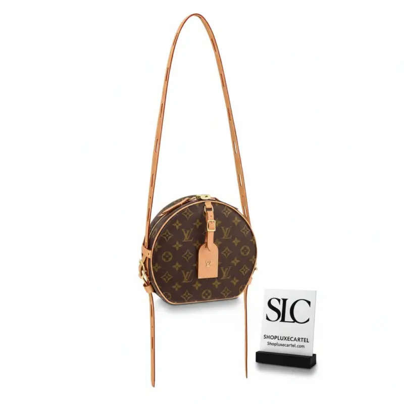 Monogram-Canvas-Round-Hat-Box-Crossbody-Bag-M52294-1.webp