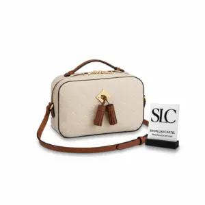 Monogram Embossed Tassel Camera Crossbody Bag M44593