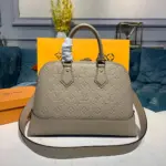 Monogram-Embossed-Top-Handle-Dome-Satchel-Bag-M44832-M44834-Galet-Monogram-Embossed-Top-Handle-Dome-Satchel-Bag-M44832-M44834-Galet-2.webp