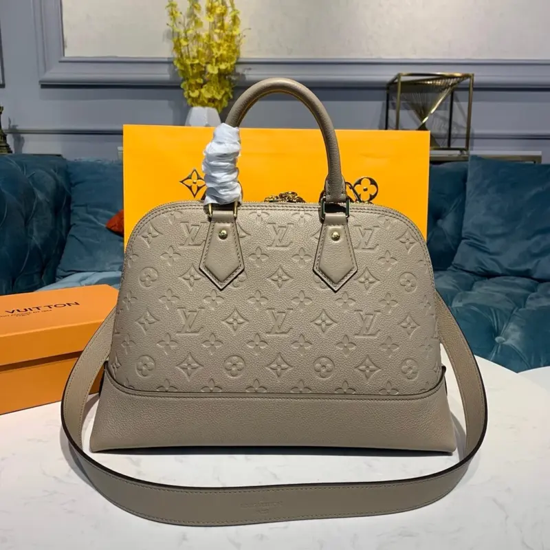 Monogram-Embossed-Top-Handle-Dome-Satchel-Bag-M44832-M44834-Galet-Monogram-Embossed-Top-Handle-Dome-Satchel-Bag-M44832-M44834-Galet-2.webp