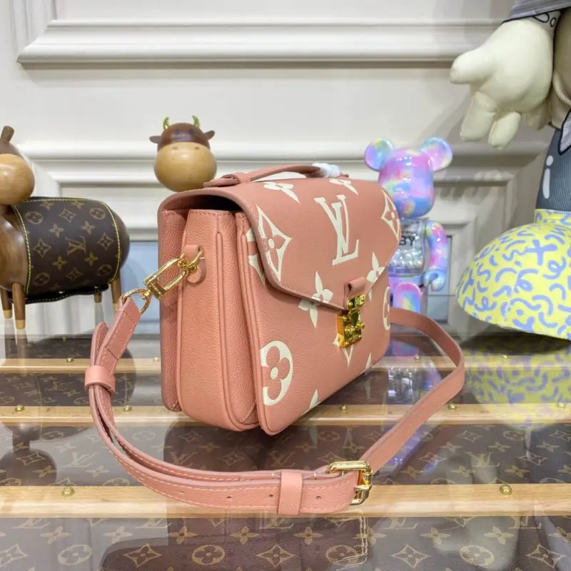 Monogram-Empreinte-Crossbody-Satchel-in-Pink-and-Cream-M46302-4.webp