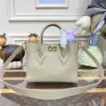 Monogrammed-Leather-Top-Handle-PM-Shoulder-Bag-M20600-M21546-Grey-Monogrammed-Leather-Top-Handle-PM-Shoulder-Bag-M20600-M21546-Grey-4.webp
