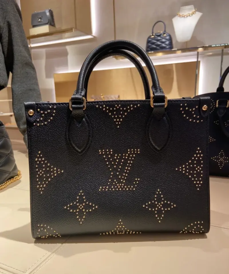 OnTheGo-PM-Tote-in-Black-Monogram-Leather-With-Studs-M46733-3.webp
