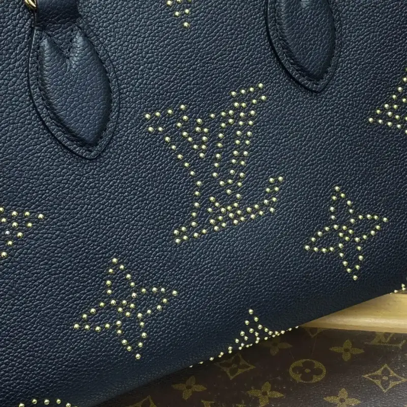 OnTheGo-PM-Tote-in-Black-Monogram-Leather-With-Studs-M46733-8.webp