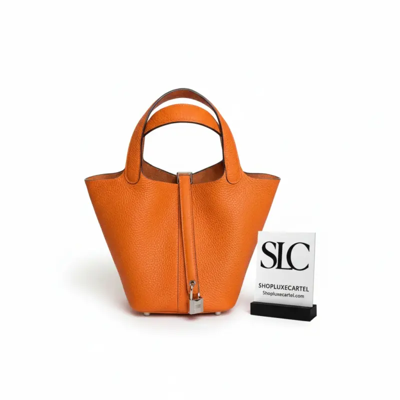 Orange-Lock-Top-Handle-Bag-in-Clemence-Grained-Leather-Orange-Lock-Top-Handle-Bag-in-Clemence-Grained-Leather.webp