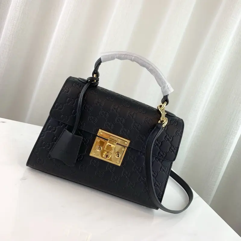 Padlock-Small-Signature-Top-Handle-Shoulder-Bag-453188-2.webp