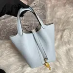 Pale-Blue-Picotin-Lock-Bucket-Bag-in-Taurillon-Clemence-22-Pale-Blue-Picotin-Lock-Bucket-Bag-in-Taurillon-Clemence-22-2.webp