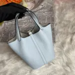 Pale-Blue-Picotin-Lock-Bucket-Bag-in-Taurillon-Clemence-22-Pale-Blue-Picotin-Lock-Bucket-Bag-in-Taurillon-Clemence-22-3.webp