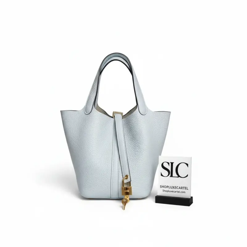 Pale-Blue-Picotin-Lock-Bucket-Bag-in-Taurillon-Clemence-Pale-Blue-Picotin-Lock-Bucket-Bag-in-Taurillon-Clemence.webp