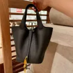 Picotin-Lock-Bucket-Bag-in-Black-Clemence-Leather-22-Picotin-Lock-Bucket-Bag-in-Black-Clemence-Leather-22-1.webp