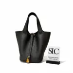 Picotin-Lock-Bucket-Bag-in-Black-Clemence-Leather-Picotin-Lock-Bucket-Bag-in-Black-Clemence-Leather.webp