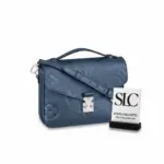 Pochette-Style-Satchel-in-Navy-Nacre-with-Top-Handle-M59211-1.webp
