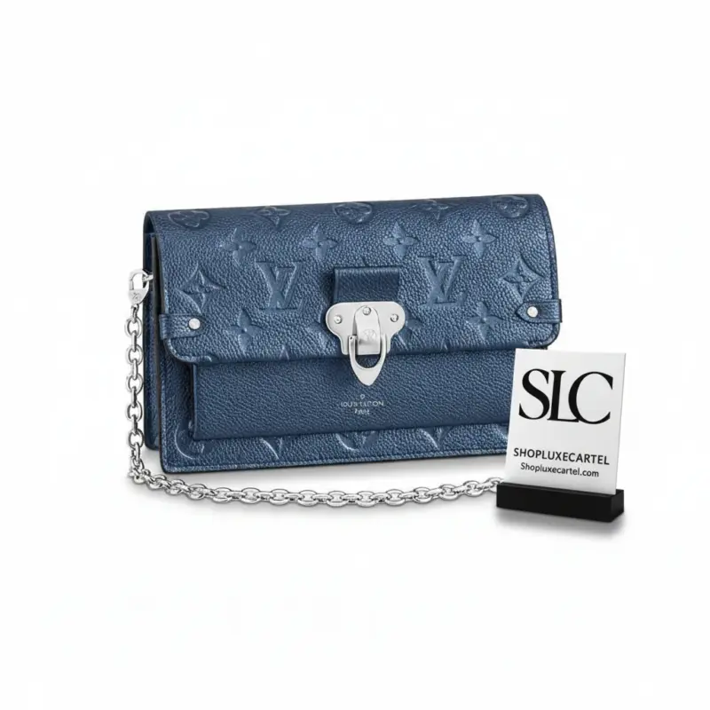 Quilted-Leather-Vavin-Chain-Wallet-in-Navy-Nacre-M59077-1.webp