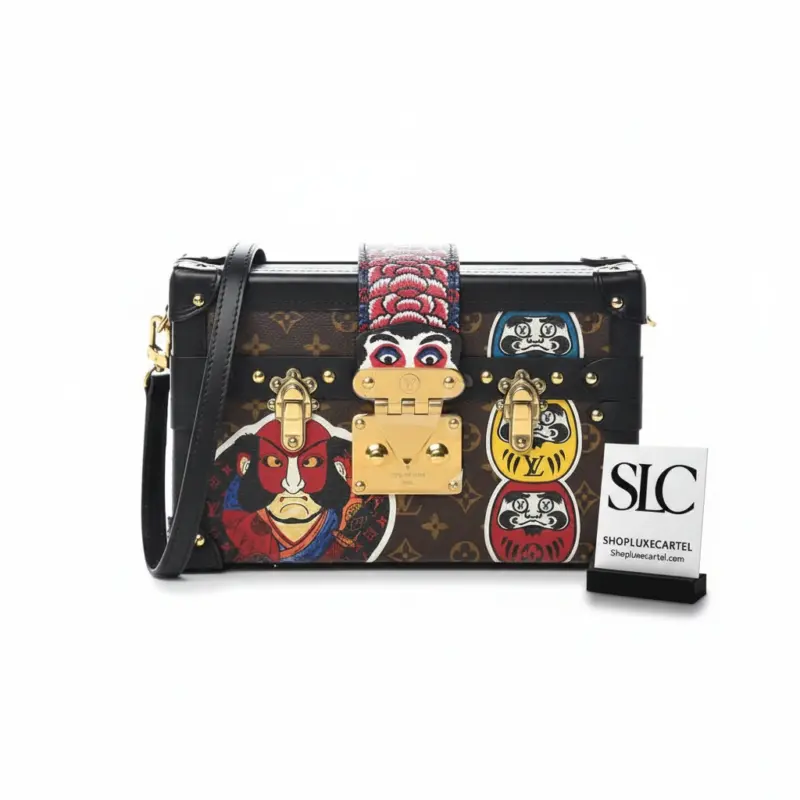 Reverse-Monogram-Kabuki-Print-Petite-Malle-Clutch-Bag-M53544-1.webp